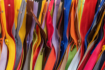 Multicolored Zippers or Zip Fasteners,  used for binding fabric or textile