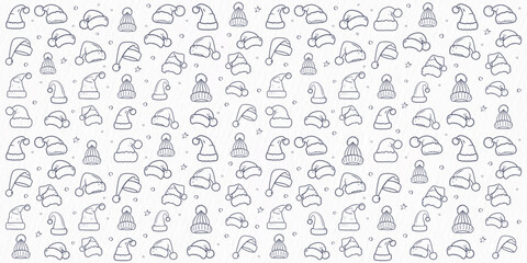 seamless hand-drawn pattern of santa hats and winter caps in black outlines on a white textured background