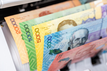 Costa Rica money. Money counting machine with Costa Rican colones. Business concept. counting...