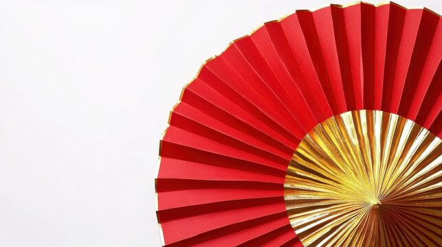 Vibrant red fan with golden inner, beautifully designed for cultural celebrations.