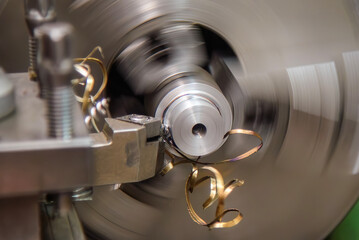 The turning machine operation with continue chip from turning process.