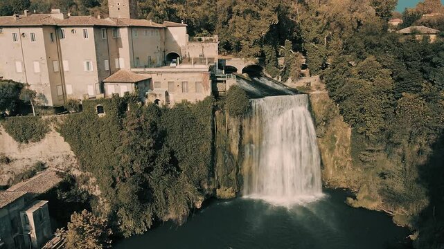 High view of the waterfall of Isola Liri: Drone view of the beautiful waterfall of the Liri river that crossed the town located in the same valley