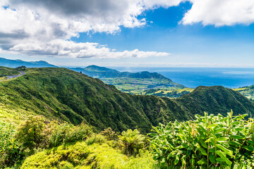 Fototapeta premium A view across the eastern rim of the Furnas Caldera on the island of Sao Miguel in the Azores in summertime