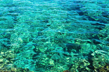 Beautiful turquoise water surface in Ayia Napa. Beautiful clea water surface with reflections.