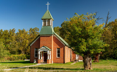 Old red brick church in the country