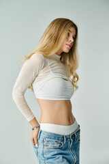 The young woman poses gracefully, embodying modern fashion and self expression.