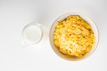 Crispy Corn Flakes with Milk Splash, Healthy Breakfast Cereal in Bowl, Morning Energy Meal