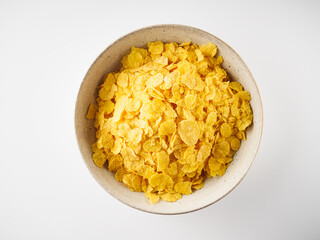 Crispy Corn Flakes with Milk Splash, Healthy Breakfast Cereal in Bowl, Morning Energy Meal