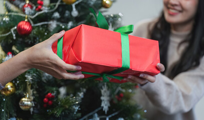 Young Woman Joyfully Prepares Her Room for a Festive Christmas Celebration with Love and Holiday Spirit