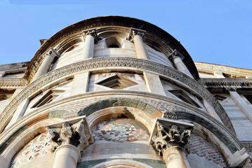 Exterior of the Duomo, Pisa, Italy, with Islamic and Byzantine influenced high arches, mosaics and lozenges