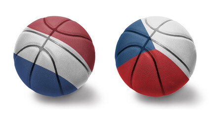 basketball balls with the national flags of czech republic and netherlands on the white background.