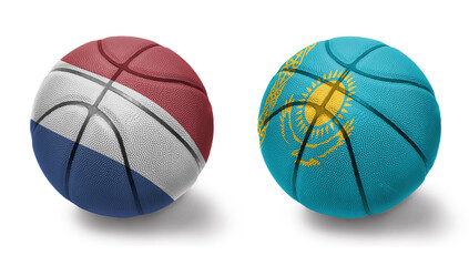 basketball balls with the national flags of kazakhstan and netherlands on the white background.