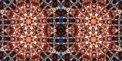 Seamless kaleidoscope pattern. The texture of the woven pattern. Endless pattern