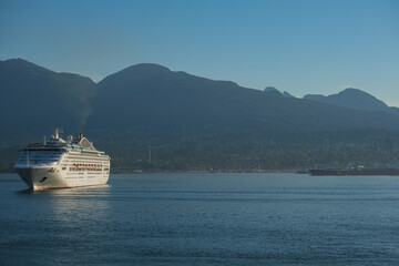 Cruiseship cruise ship liner P World arrival into Vancouver, BC port with scenic mountain glacier...