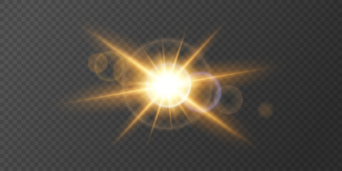 Golden flashes of light with rays. Glow bright star on a transparent background. Flare of sunshine, vector illustration.
