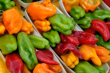 Fresh yellow, orange and red bell peppers