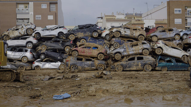 Crowd of cars destroyed by floods in Alfafar, Valencia, Spain. natural disaster.November 2024