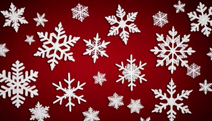 Beautiful white snowflakes on a red background.