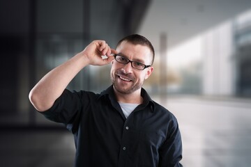 Confident business man posing outdoors