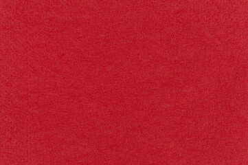 Macro image of red paper napkin. Warm red textured background image.