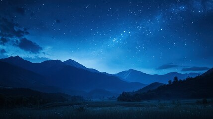 Blue sky with the first stars of the night twinkling softly, hinting at the galaxy vastness above.