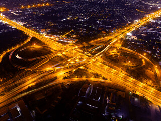 Time lapse,Hyperlapse, Of traffic on city streets at night. Aerial view and top view of traffic on freeway, Expressway top view, Road traffic an important infrastructure