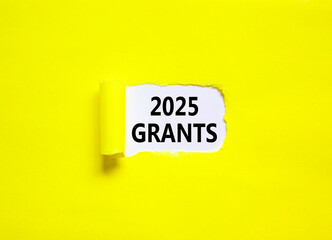 Planning 2025 grants new year symbol. Concept words 2025 Grants on beautiful white paper. Beautiful yellow paper background. Business 2025 grants new year concept. Copy space.