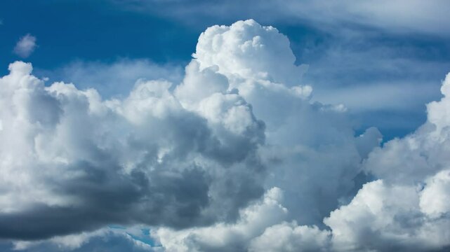 A time-lapse video of cumulus clouds moving across the sky. The moment of formation of a thundercloud