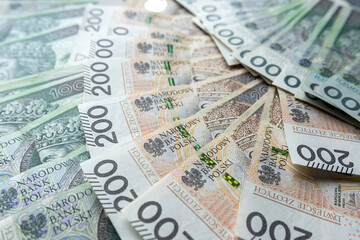  Many polish banknotes 100, 200 as financial background