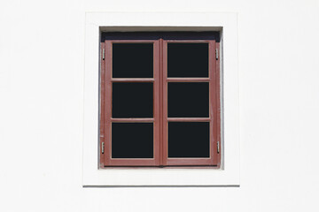 Fototapeta premium Wooden window frame on a white building facade. Empty window with darkness inside. Rustic architecture with natural wood and simple design. Minimalist scene with light and shadow contrast.