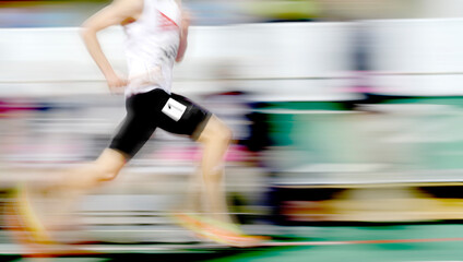Runner Running a Race on Track with Baton Relay Team Score
