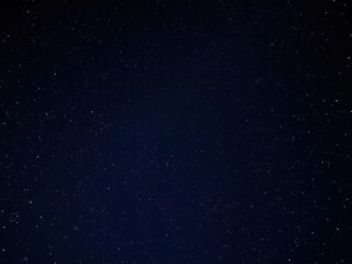 Obraz premium Starry night sky with a focus on the constellations Orion and Cassiopeia, cosmic landscape, astronomy, orion constellation