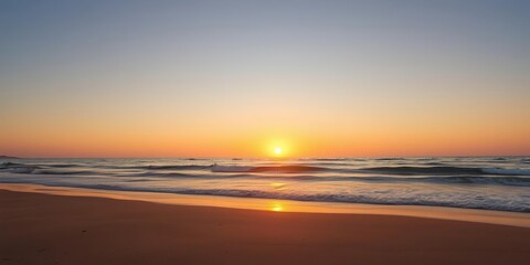 Obraz premium Soft golden light on the beach as a serene sea sunset unfolds, sunset, rock