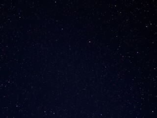 Fototapeta premium Starry night sky with a focus on the constellations Orion and Cassiopeia, night sky, nebulae