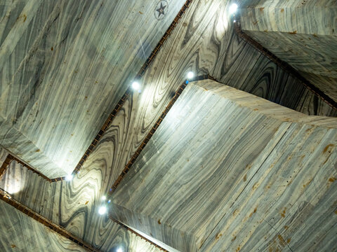view from the bottom to the ceiling of  slanic prahova salt mine, tourist attractions and a respiratory treatment base in romania