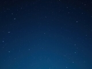 An ethereal starry night scene with a few shooting stars streaking across the sky, stardust, celestial