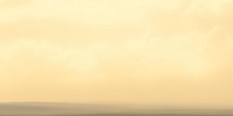 Fototapeta premium Soft yellow haze with wispy blue clouds drifting across a serene landscape, soft brushstrokes, misty landscape, watercolor art