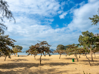 Repulse bay beach landscape view in Hong Kong, under cloudy blue sky in summer, with some...