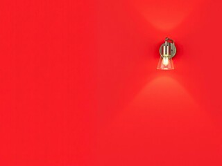 Stylish wall sconce against a bold colored accent wall, minimalist decor, contemporary lighting, wall sconce