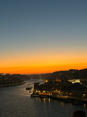 Naklejka premium Beautiful Sunset in oporto bridge 