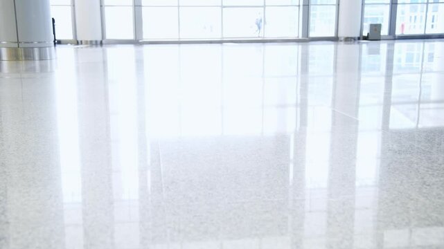 Low section of people walking in exhibition hall