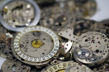 Old mechanical watches with gears and cogs. Watch or clock mechanisms