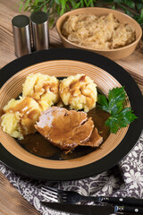 Braised pork neck in own sauce. Shallow depth of field.