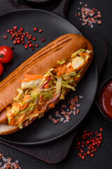 Hotdog with grilled sausage with cabbage, carrots and onions