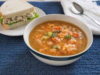 Lentil Soup and Chicken Salad Sandwich on Blue Horizontal