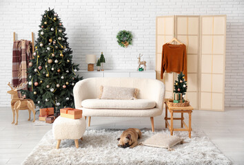 Cute dog lying at home on Christmas eve