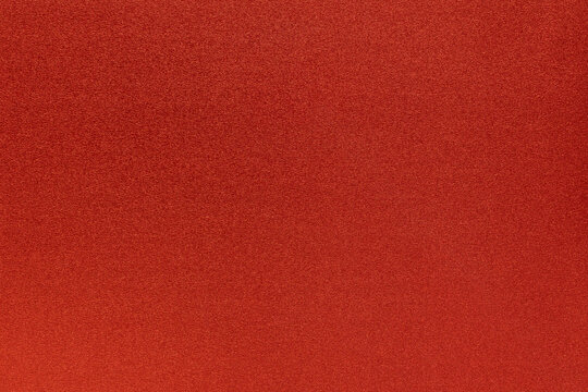 Fondo texturizado color rojo de material de goma Eva con brillantina