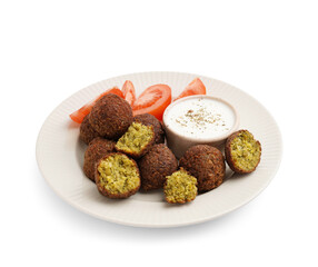 Plate with delicious falafel balls, sauce and tomatoes on white background