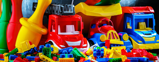 Composition with colorful plastic children toys