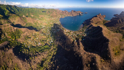 magnificent aerial view of taiohae bay by setting sun and very good weather on the island of NUKU HIVA in the Marquesas archipelago in French Polynesia